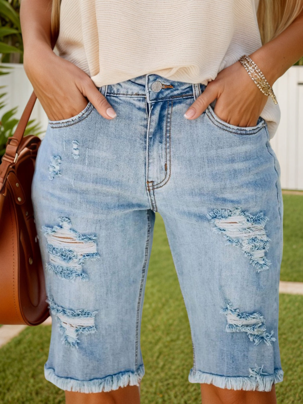 Women's Distressed Three-Quarter Denim Shorts with Frayed Hem in Blue – AdriaPulse