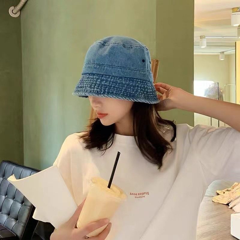 "Unisex denim bucket hat in black with flat top and short brim, minimalist casual fisherman style – AdriaPulse"