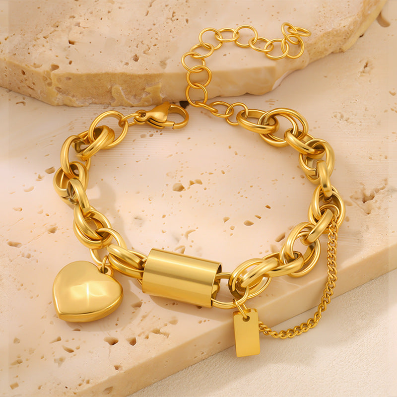 Vielseitiges Titanarmband mit herzförmigem Anhänger
