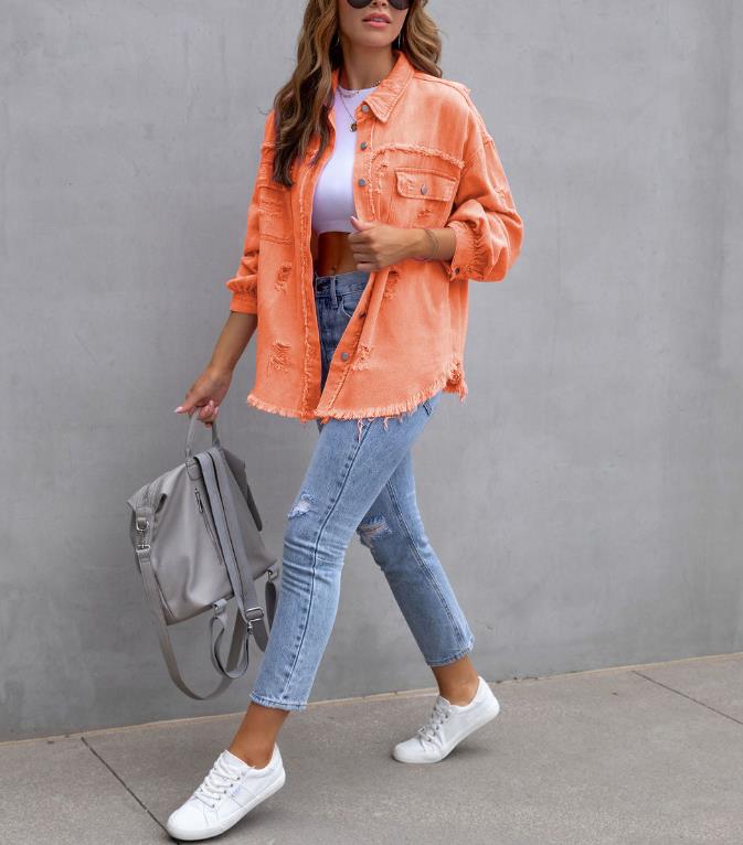 "Women's oversized frayed black denim shacket with ripped distressed detail and button-down closure, casual festival style – AdriaPulse"