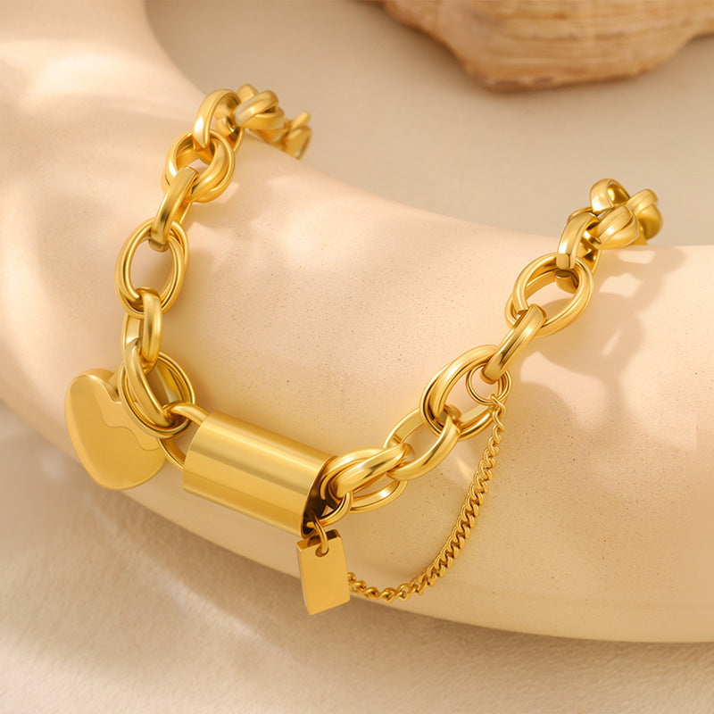 Vielseitiges Titanarmband mit herzförmigem Anhänger