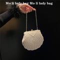 Muschelförmige Umhänge-Schultertasche für Damen