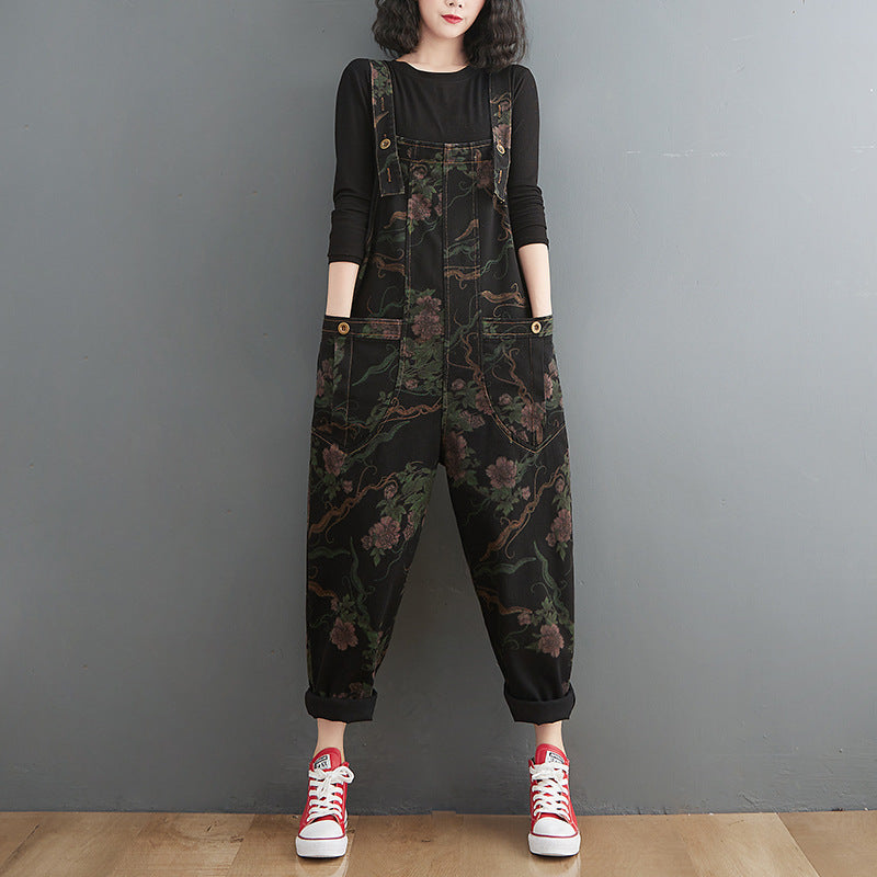 "Women's black water-washed slim-fit denim suspender overalls with print detail, urban casual spring summer style – AdriaPulse"